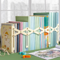 Book stand retractable retainer folding book shelf